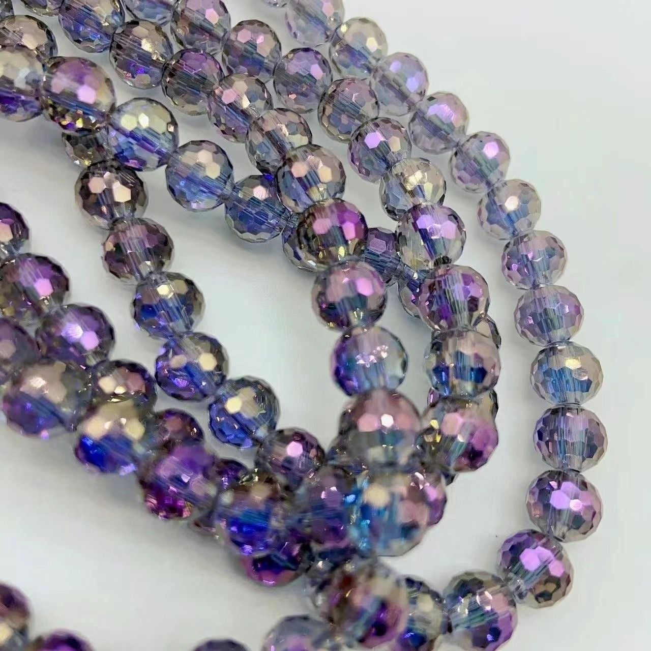 8mm Glass faceted strands (approx 70pcs)
