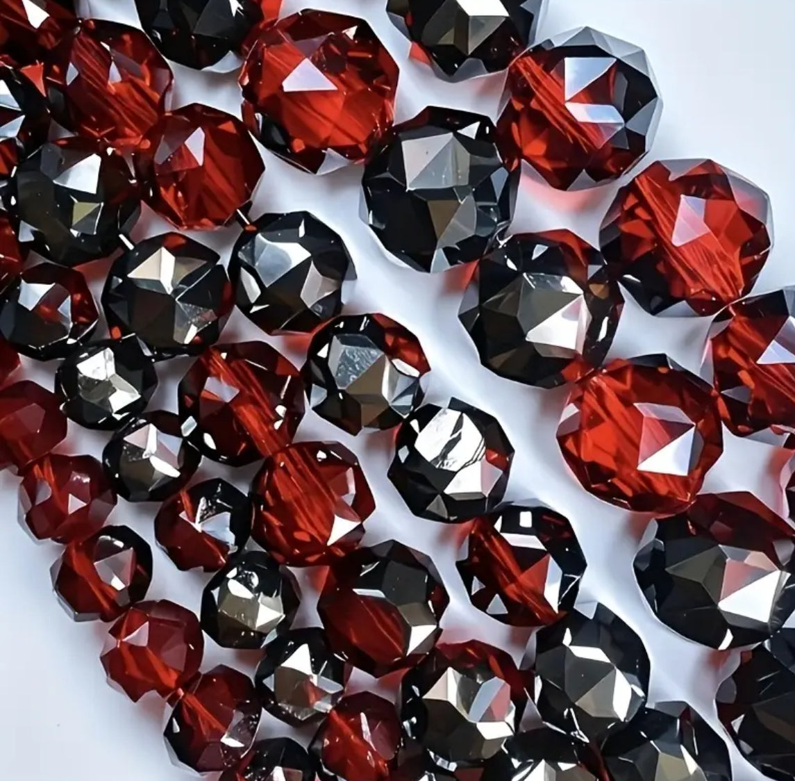 Glass faceted strands (approx 70pcs)